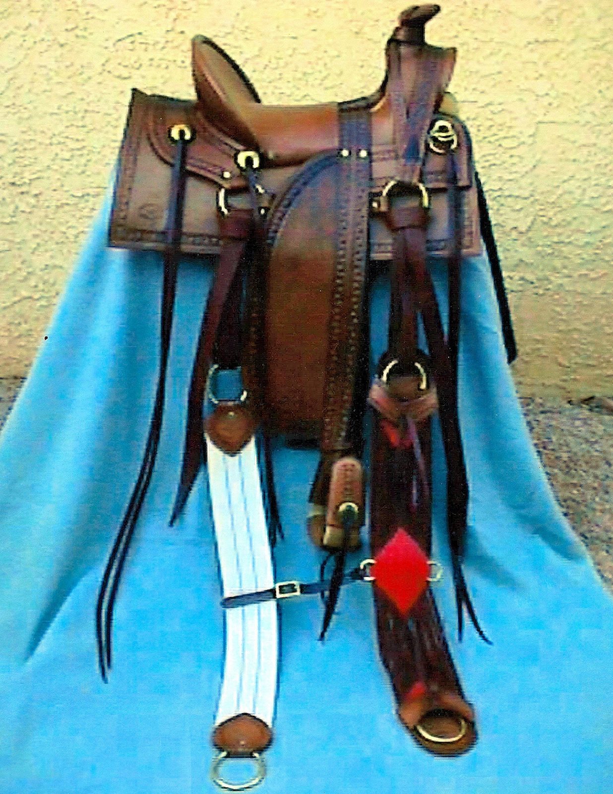 #112 saddle with bridle and breast collar starts at